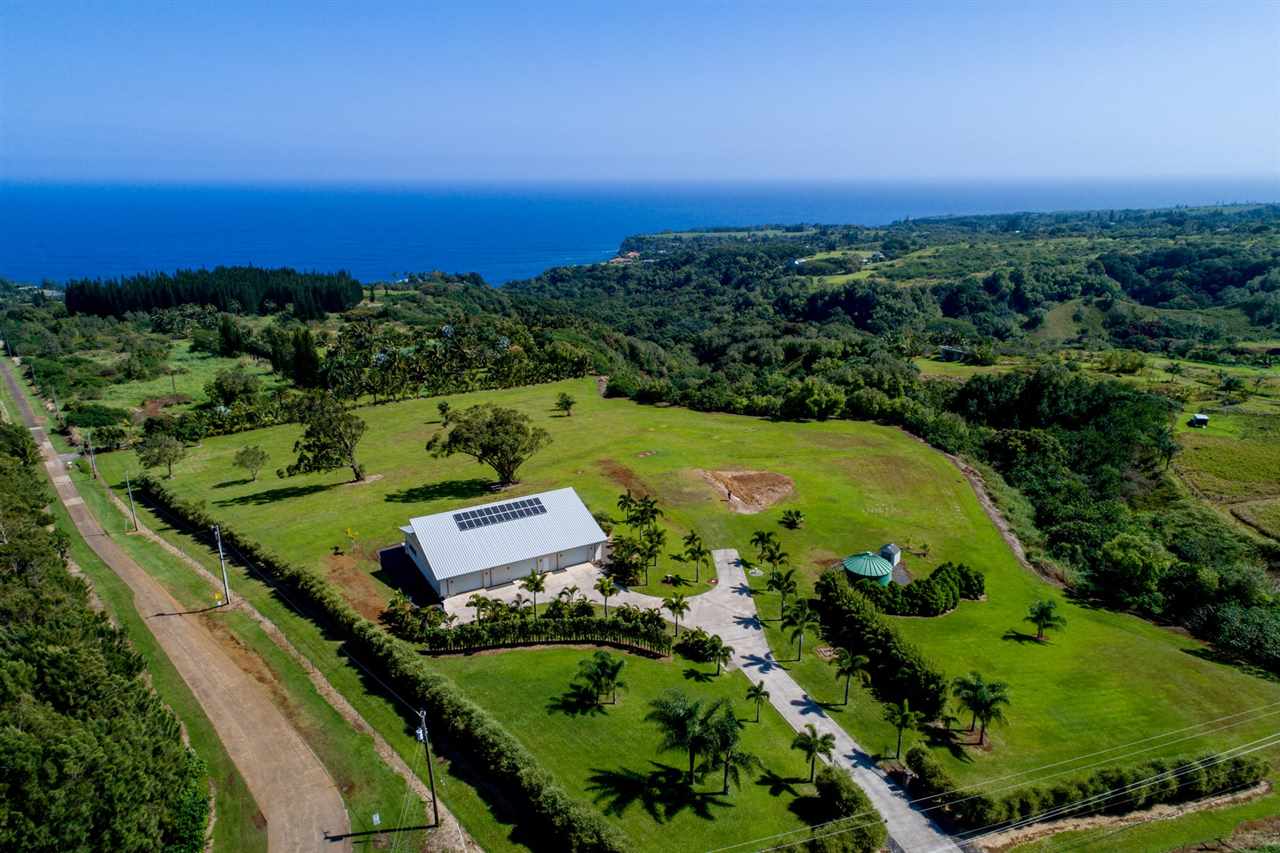 4605 Hana Highway Haiku, HI 96708 - Photo 4 of 30 an aerial view of a residential houses with outdoor space and swimming pool