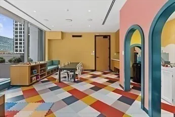 a view of a livingroom with furniture and rug