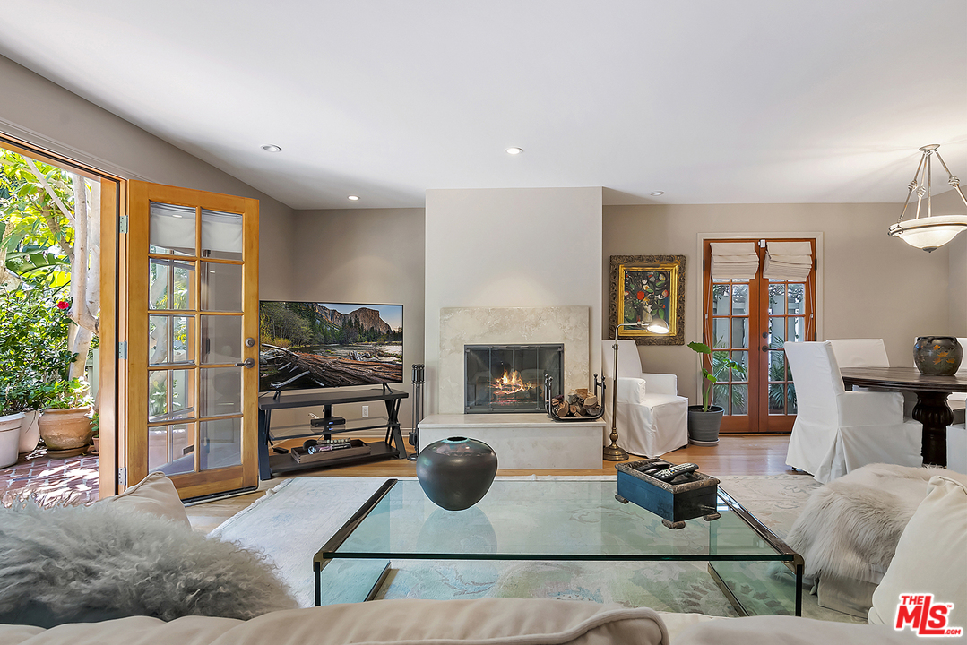 21 Westwind Street Marina del Rey, CA 90292 - Photo 25 of 52 a living room with furniture and a fireplace