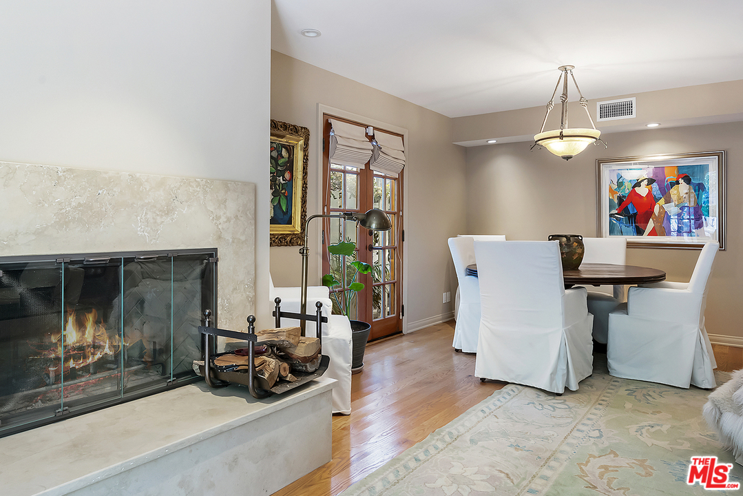 21 Westwind Street Marina del Rey, CA 90292 - Photo 27 of 52 a living room with furniture a window and wall painting