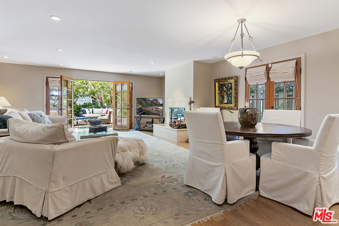 21 Westwind Street Marina del Rey, CA 90292 - Photo 28 of 52 a living room with furniture and a chandelier