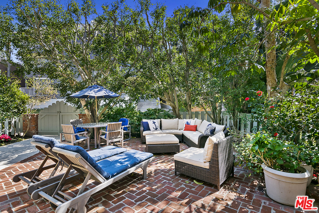 21 Westwind Street Marina del Rey, CA 90292 - Photo 9 of 52 a outdoor living space with furniture and a potted plant