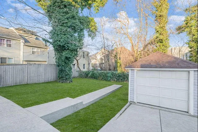 a view of a backyard with a garden