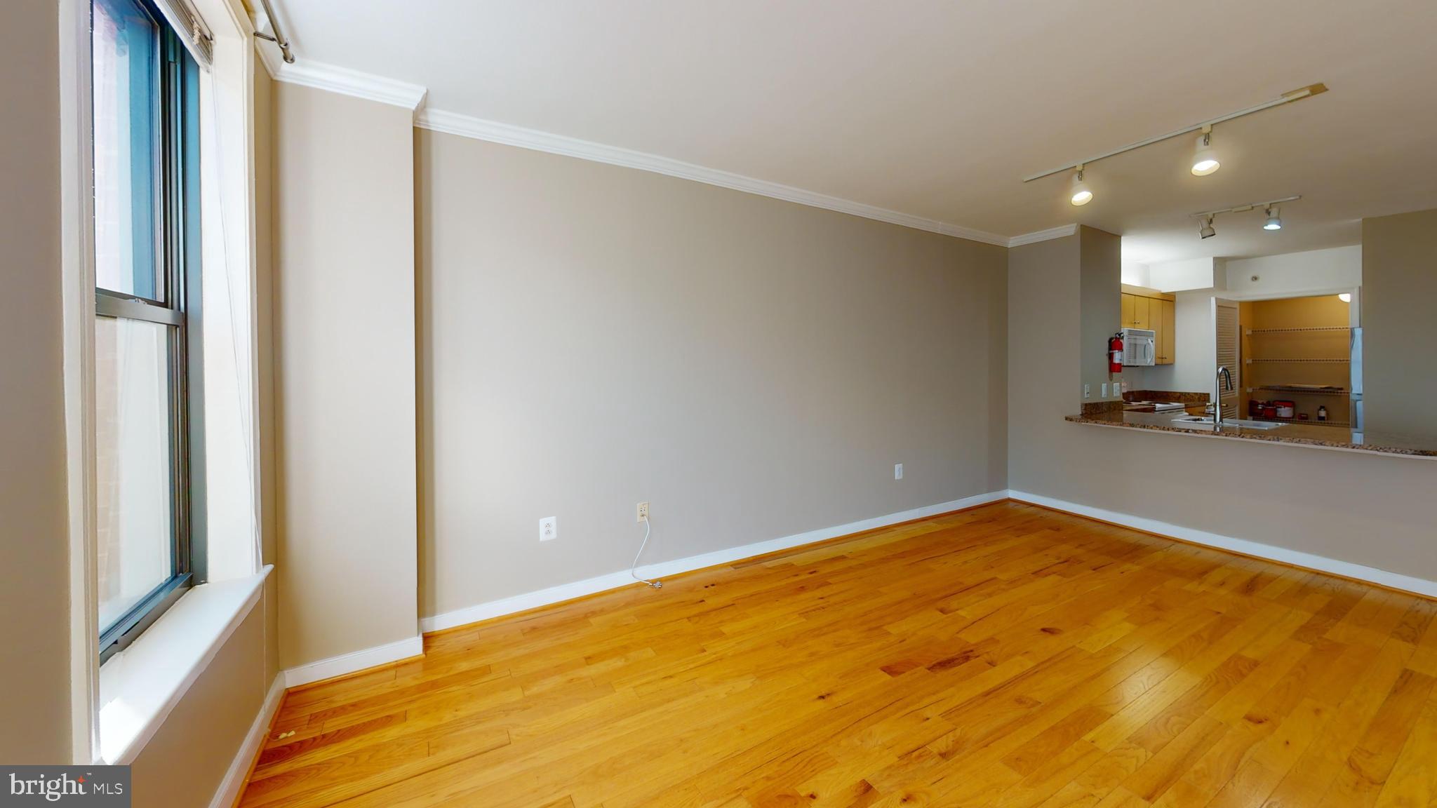 631 D Street Northwest, Unit 931 Washington, DC 20004 - Photo 8 of 20 a view of a livingroom with a staircase