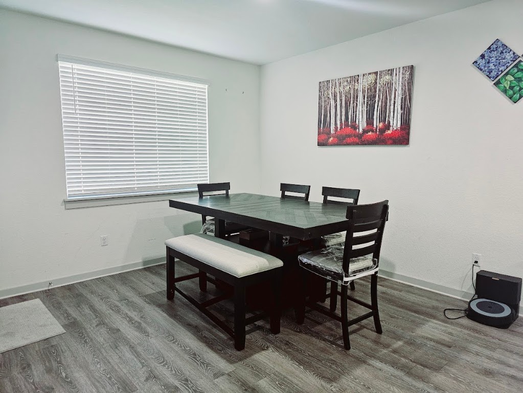 121 Merrick Road Georgetown, TX 78628 - Photo 12 of 29 a view of a workspace with furniture and a window