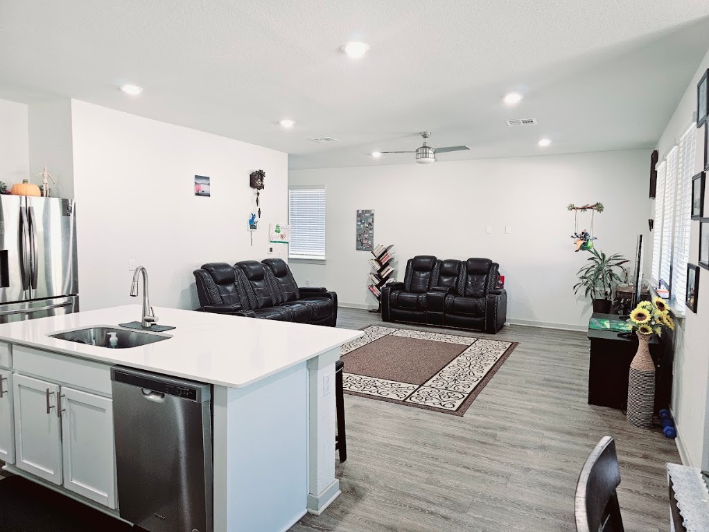 121 Merrick Road Georgetown, TX 78628 - Photo 29 of 29 a kitchen with sink and refrigerator