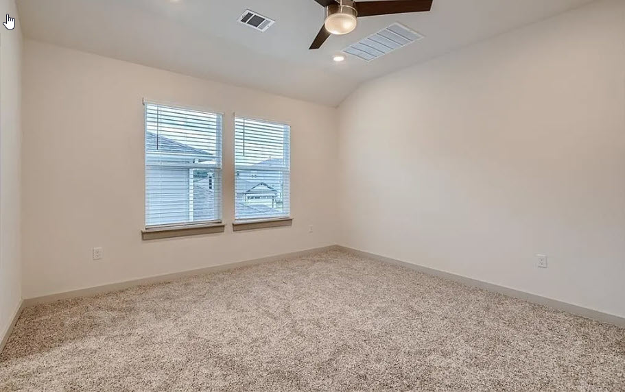 121 Merrick Road Georgetown, TX 78628 - Photo 15 of 29 an empty room with windows