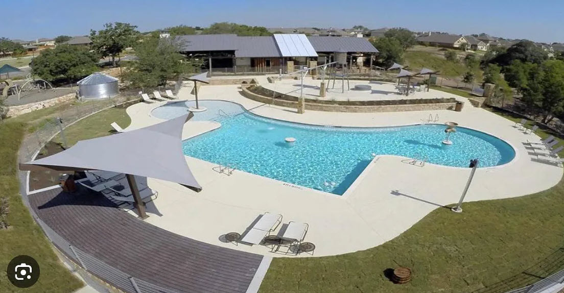 121 Merrick Road Georgetown, TX 78628 - Photo 25 of 29 an aerial view of a house with swimming pool and a yard