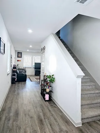 a living room with furniture and a couch