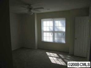 424 Morningside Road Charlotte, NC 28214 - Photo 6 of 8 a view of an empty room with a window