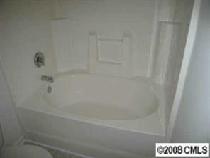 424 Morningside Road Charlotte, NC 28214 - Photo 7 of 8 a close up of a bathtub