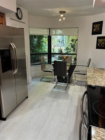 a bedroom with a bed and a tub