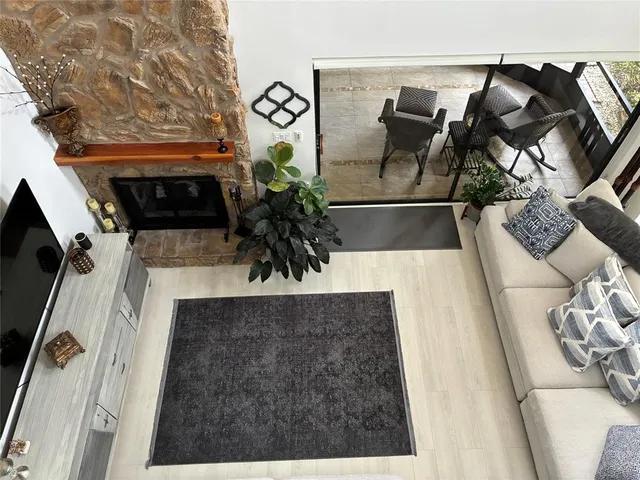 a view of a tables and chairs in a patio