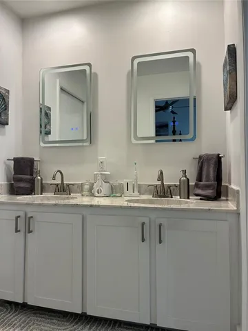 a outdoor space with a large window and sitting area