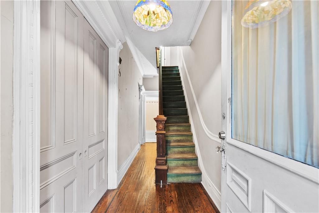 484 Decatur Street Brooklyn, NY 11233 - Photo 2 of 23 a view of entryway with wooden floor