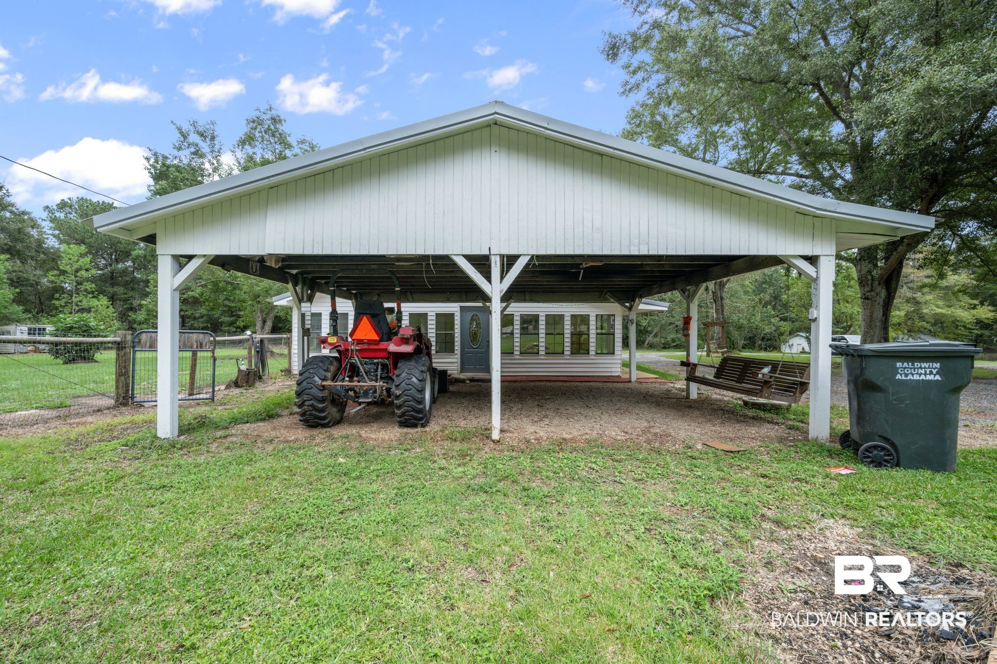 54855 Ramer Drive Bay Minette, AL 36507 - Photo 7 of 20 View of property's community with a lawn