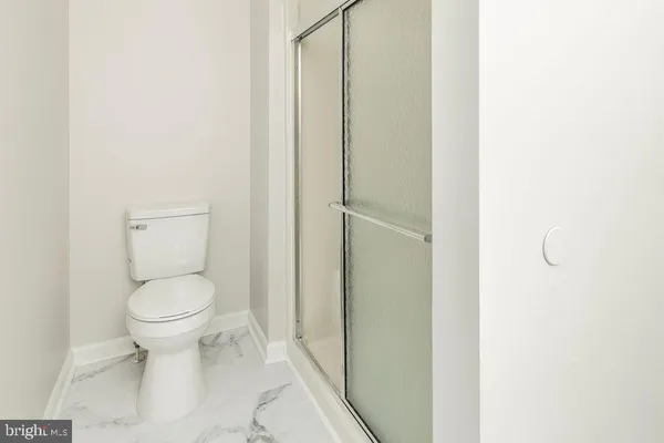 a bathroom with a toilet