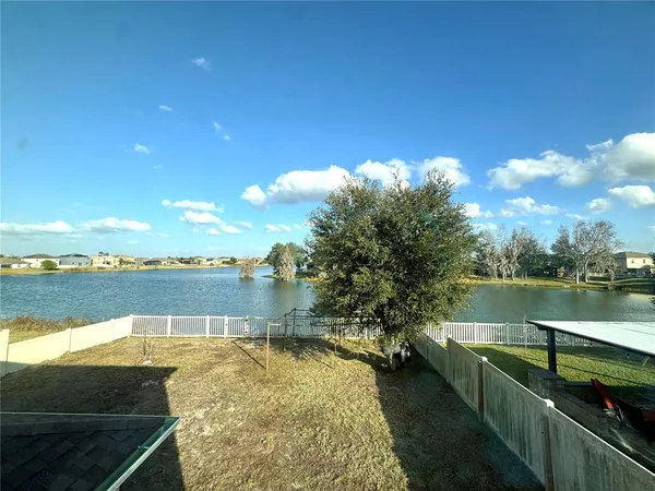 a view of a lake with a outdoor space