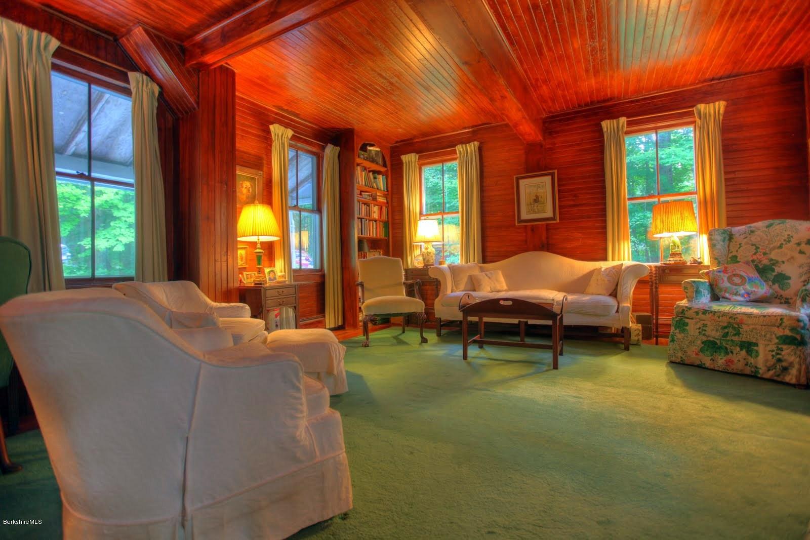 585 Main Road Monterey, MA 01245 - Photo 14 of 27 a living room with furniture and large windows