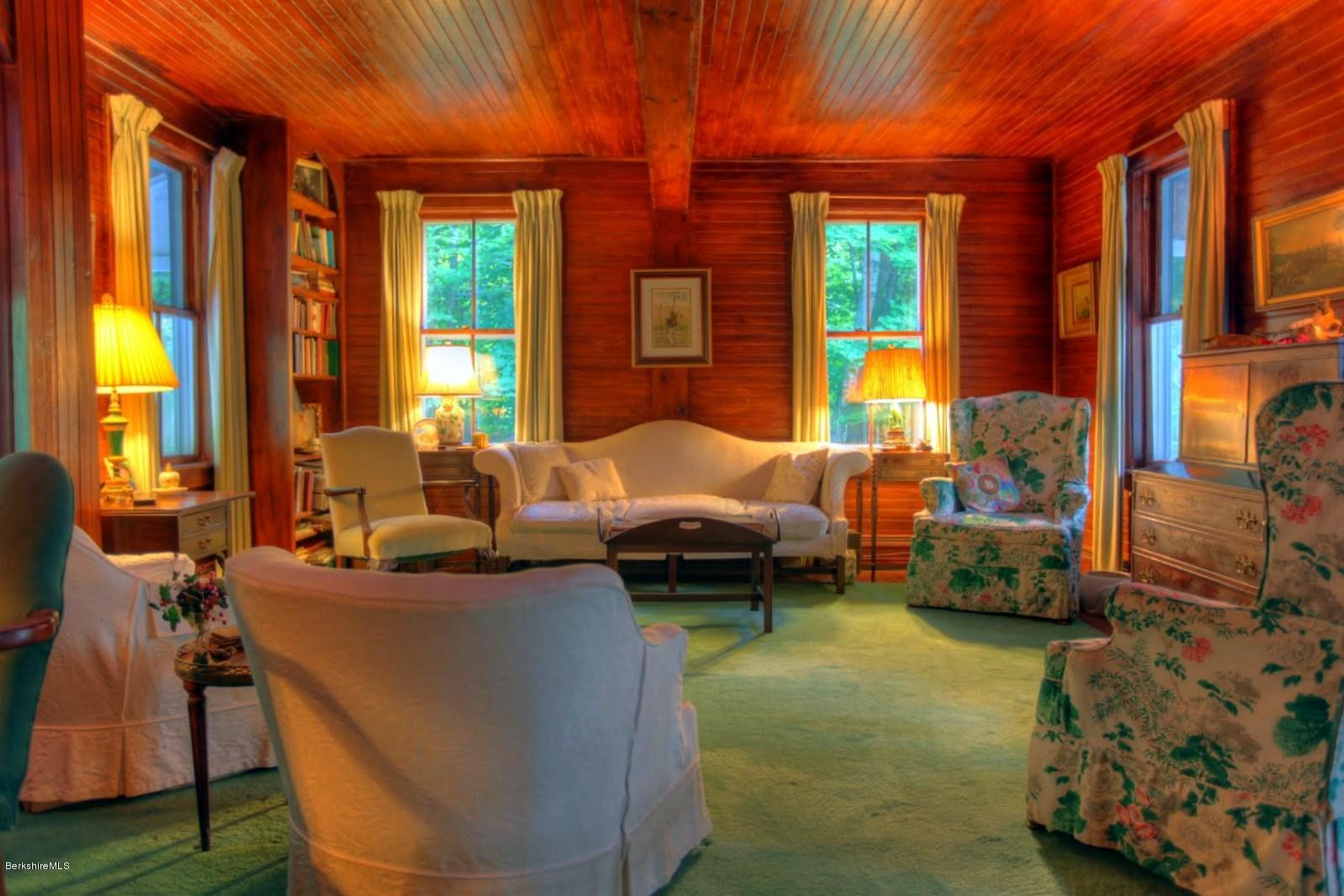 585 Main Road Monterey, MA 01245 - Photo 15 of 27 a living room with furniture and large windows