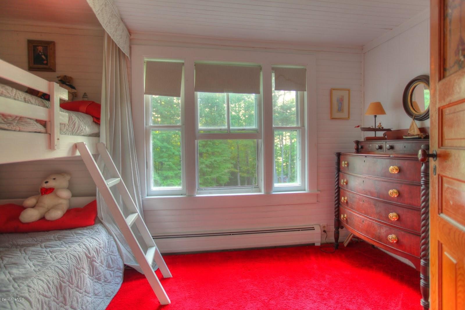 585 Main Road Monterey, MA 01245 - Photo 17 of 27 a room with furniture and a window
