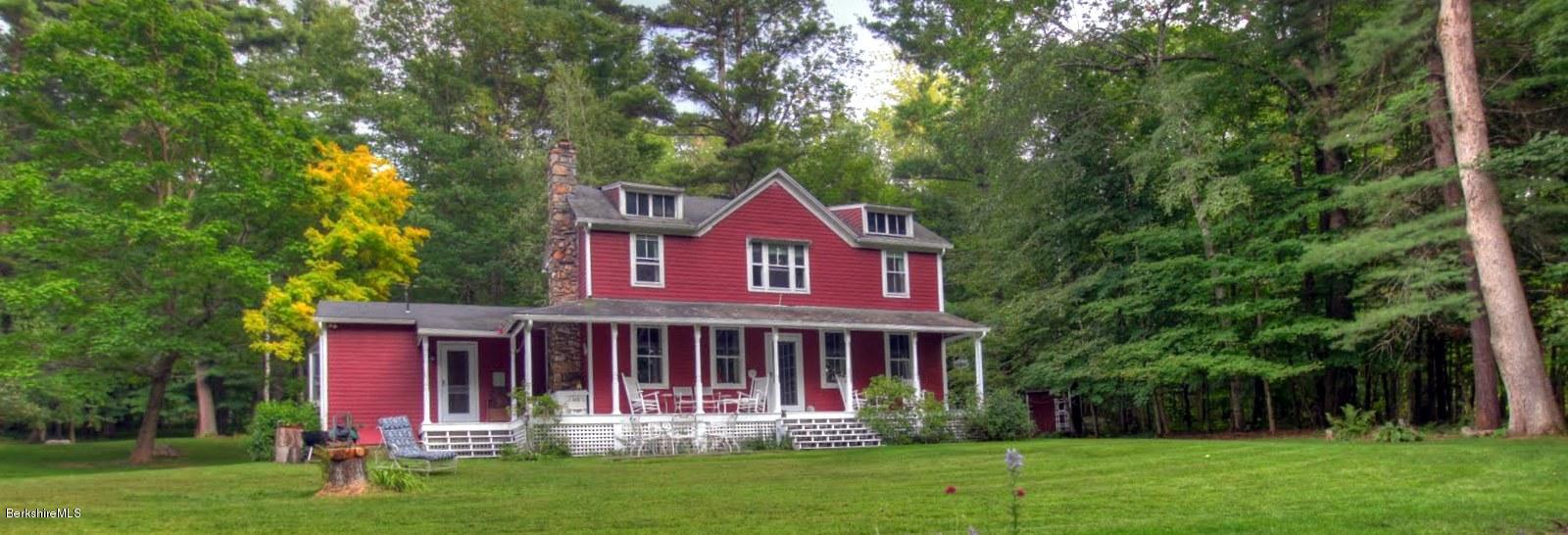 585 Main Road Monterey, MA 01245 - Photo 20 of 27 a view of a house with a yard potted plants and large tree
