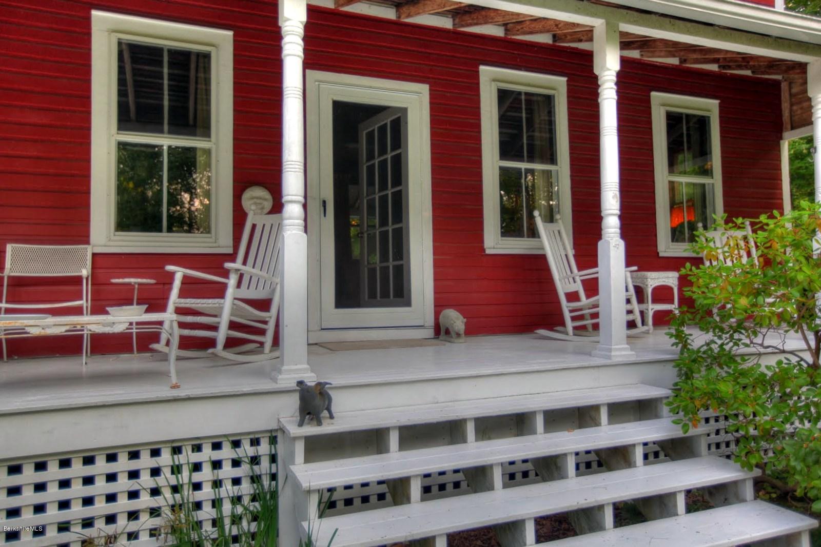 585 Main Road Monterey, MA 01245 - Photo 22 of 27 front view of a house with a porch