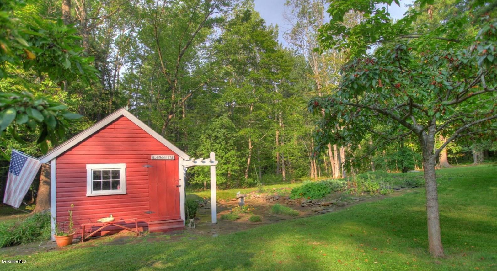 585 Main Road Monterey, MA 01245 - Photo 25 of 27 a view of backyard of house with green space