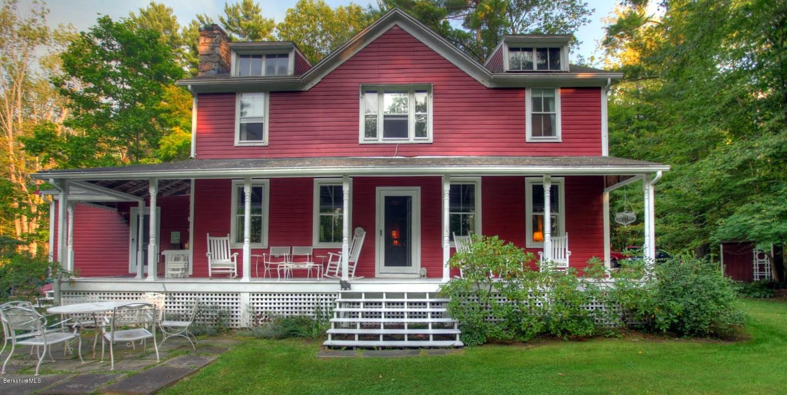 585 Main Road Monterey, MA 01245 - Photo 4 of 27 front view of a house with a yard