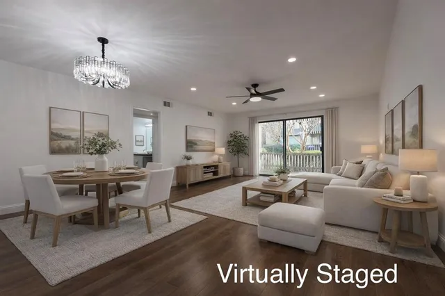 a living room with furniture or window and a table