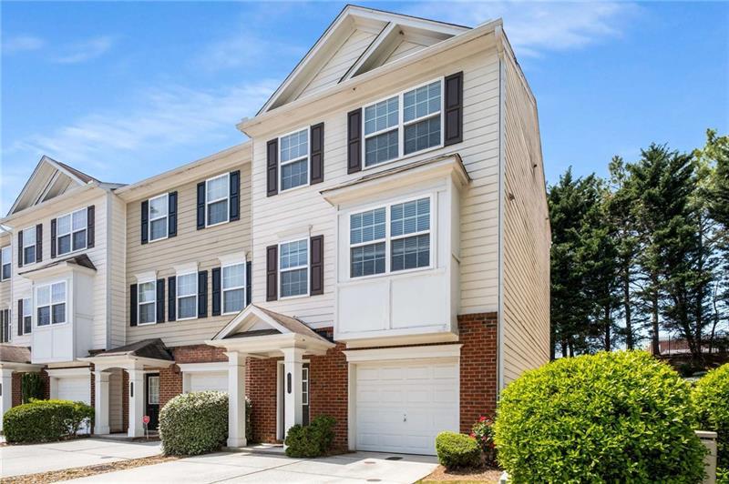 2419 Ivey Crest Circle Tucker, GA 30084 - Photo 1 of 1 a front view of a house with a yard