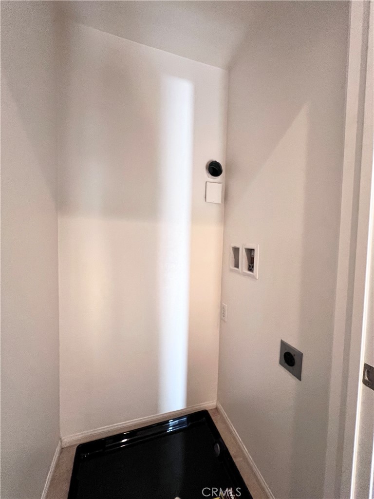 58 South 5th Street, Unit F Alhambra, CA 91801 - Photo 15 of 24 a view of small space with racks on the wall