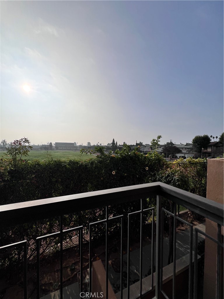 58 South 5th Street, Unit F Alhambra, CA 91801 - Photo 22 of 24 a view of city and trees from a balcony