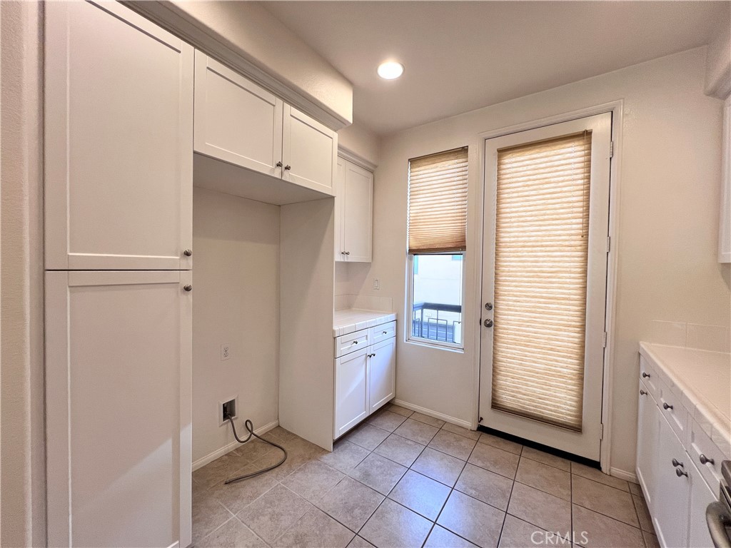 58 South 5th Street, Unit F Alhambra, CA 91801 - Photo 9 of 24 a view of a kitchen with refrigerator and dishwasher