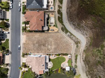 a view of a yard with an ocean