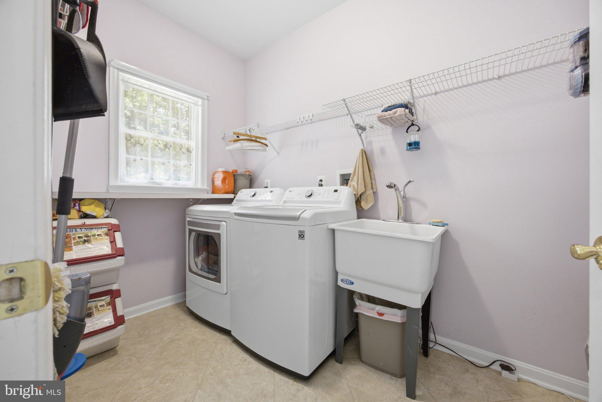 3723 Bay Road Street, MD 21154 - Photo 18 of 57 Main level separate laundry room w/utility sink
