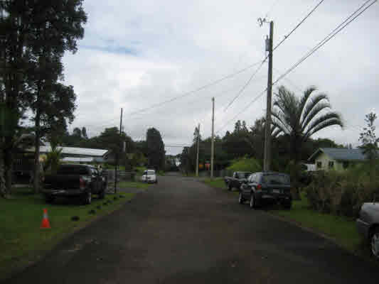 418 Ekika Road Mountain View, HI 96771 - Photo 7 of 9 a car parked on the side of the road