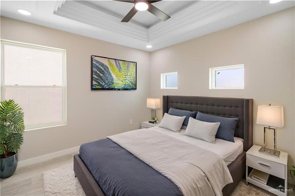3429 May Street Mission, TX 78573 - Photo 6 of 16 a bedroom with bed and window