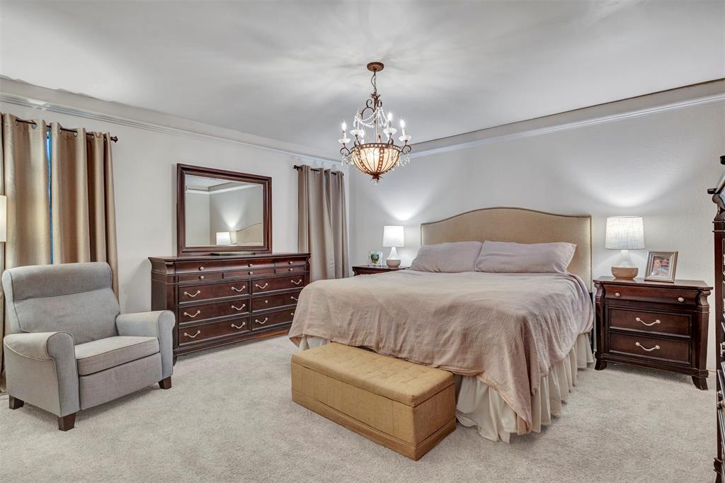 2317 Daybreak Trail Plano, TX 75093 - Photo 15 of 29 a bedroom with a bed and a couch