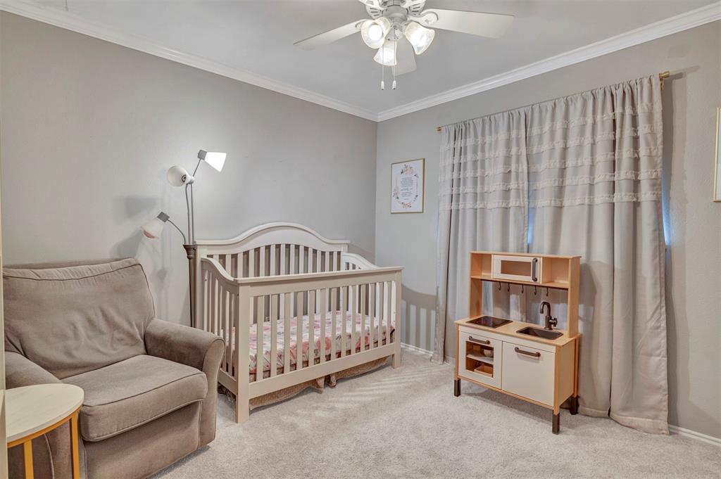 2317 Daybreak Trail Plano, TX 75093 - Photo 18 of 29 a bedroom with furniture and a window