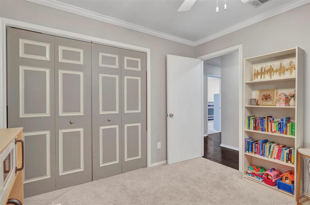 2317 Daybreak Trail Plano, TX 75093 - Photo 19 of 29 a view of an empty room with shelves