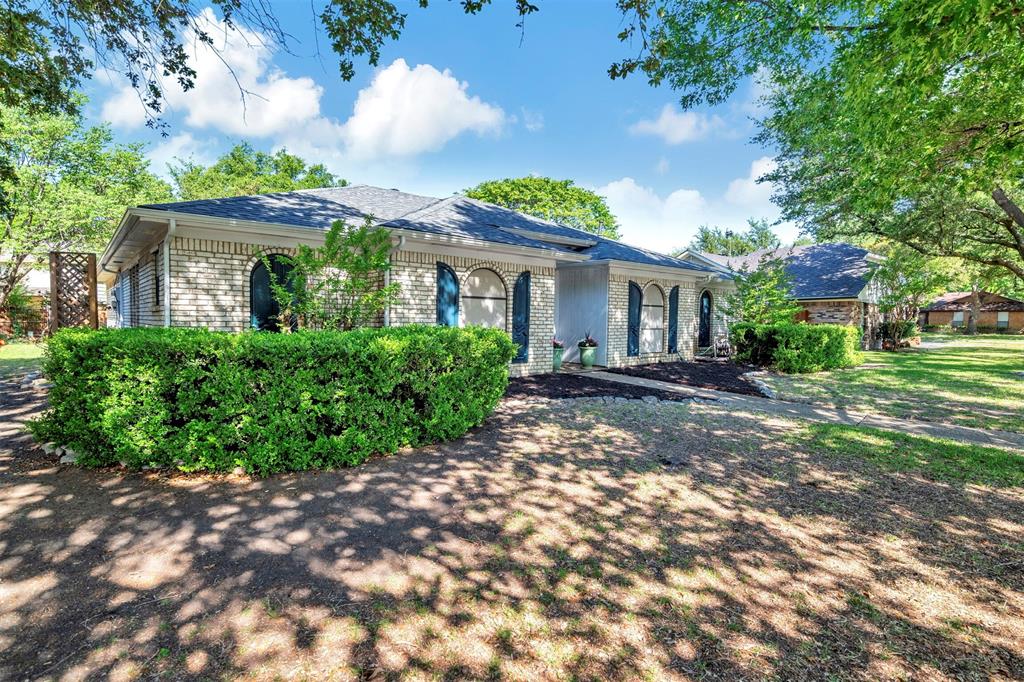 2317 Daybreak Trail Plano, TX 75093 - Photo 28 of 29 front view of a house with a yard