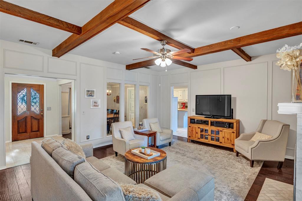 2317 Daybreak Trail Plano, TX 75093 - Photo 6 of 29 a living room with furniture and a flat screen tv