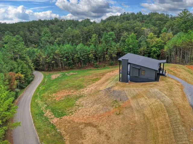 a view of a backyard with a garden