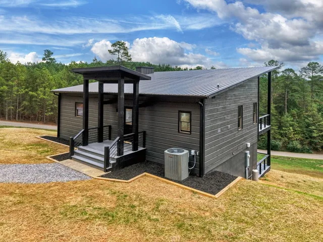 a view of a chairs and table in the patio