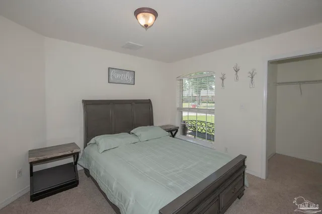 a room with window and bathroom