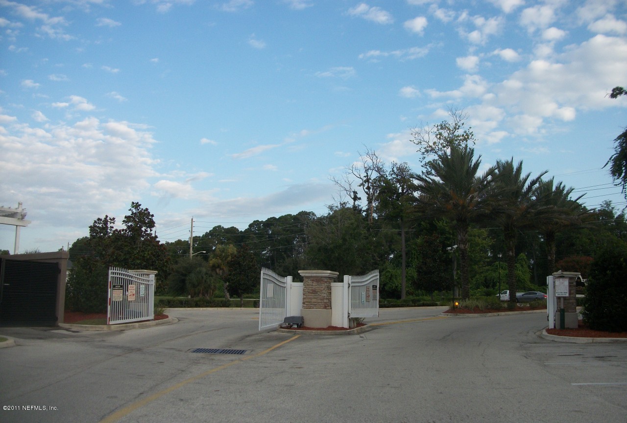 7920 Merrill Road, Unit 1511 Jacksonville, FL 32277 - Photo 11 of 11 a view of a terrace with a garden and stairs