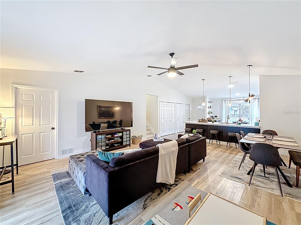 14908 Southwest 46th Circle Ocala, FL 34473 - Photo 13 of 46 a living room with furniture and a flat screen tv