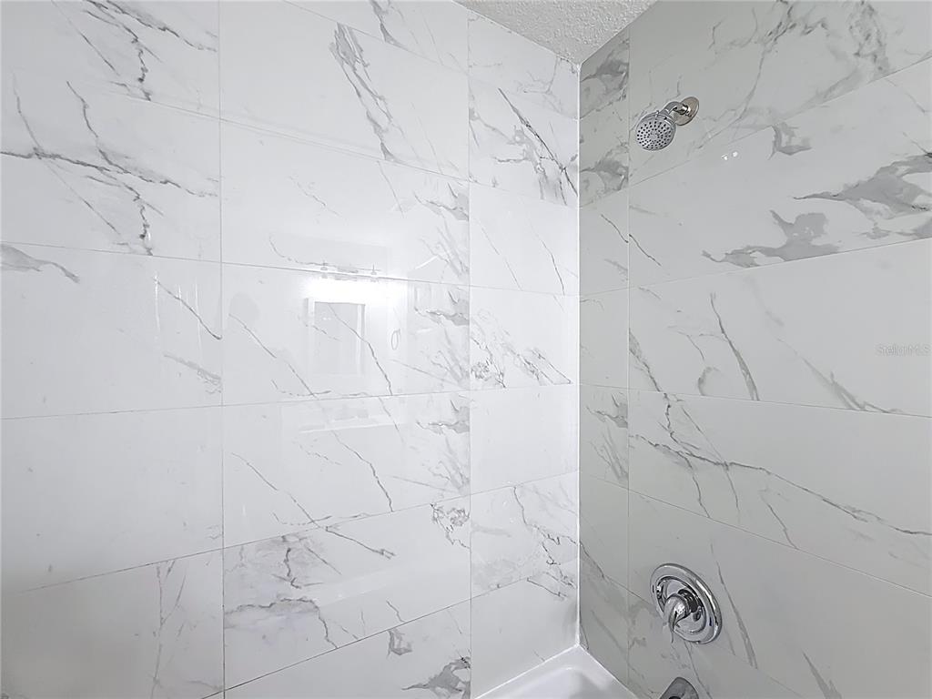 14908 Southwest 46th Circle Ocala, FL 34473 - Photo 33 of 46 a bathroom with a shower