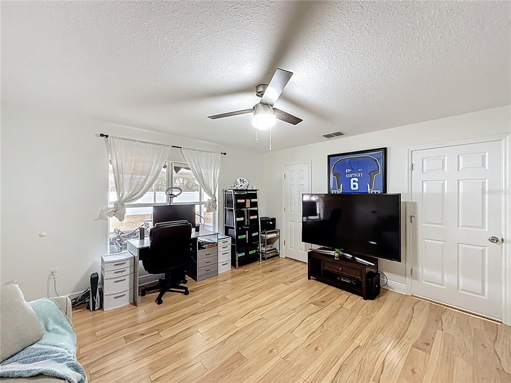 14908 Southwest 46th Circle Ocala, FL 34473 - Photo 35 of 46 a view of a livingroom with workspace and a window